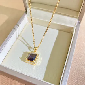Gold titanium steel necklace featuring a purple square zircon pendant with sparkling diamonds.