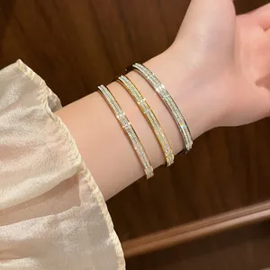Elegant titanium steel rhinestone crystal bracelet for women, sparkling double-row diamond bangle.