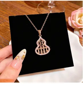 Chic rose gold hollow gourd abacus necklace for women, stylish niche clavicle chain jewelry.