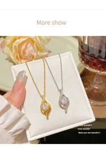 Close-up detail of geometric zircon pendant necklace, sparkling stones and elegant style.