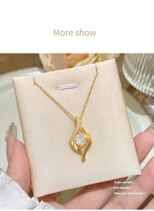 Detailed view of the stylish gold geometric zircon pendant necklace, elegant accessory.