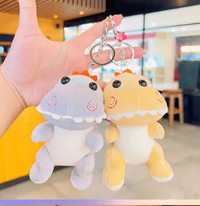 Hermoso detalle de llavero de dinosaurio de peluche, colgante de mochila suave.
