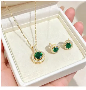 Exquisite round green gemstone necklace and earrings jewelry set with sparkling cubic zirconia.