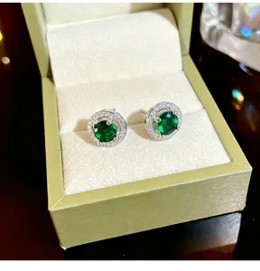 Stunning round green zircon stud earrings with sparkling crystal halo for women, elegant.