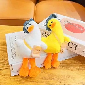 Cute plush duck bag pendant keychain, soft toy doll with mini denim hat and toast bag for backpack decoration.