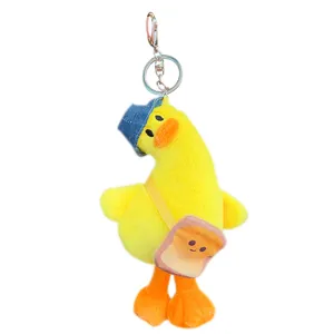 Cute plush crooked head duck keychain, soft stuffed backpack duck pendant toy for bags and keys.