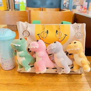 Lindo peluche dinosaurio llavero mochila colgante juguete suave para bolso muñeca.
