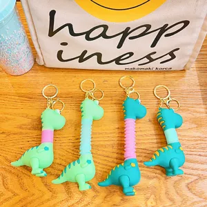 Simpatico portachiavi dinosauro telescopico, ciondolo borsa divertente regalo colorato.
