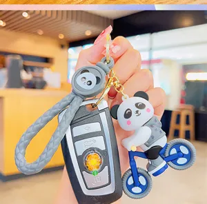 Cute cartoon panda keychain and car key cover set, perfect stylish bag pendant and gift for students.