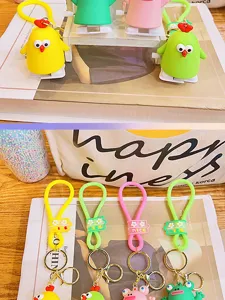 Cute cartoon wind-up animal keychains, creative plastic and silicone toy bag pendants.