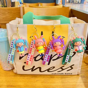 Süßer Cartoon geflochtene Mädchen Schlüsselanhänger Tasche Charme Geschenk für Freunde