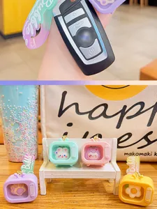 Mini luminous TV keychain cute cartoon doll bag pendant for car key chain accessories