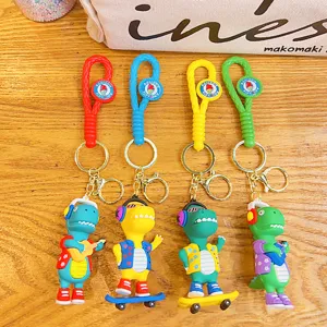Schattige tekenfilm dinosaurussen sleutelhanger set met gevlochten koorden en tasbedels.