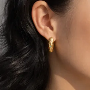 Gold stainless steel hoop earrings featuring colorful zircon stones for women daily wear.