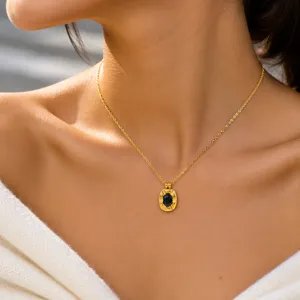 Exquisite stainless steel gold chain necklace featuring an elegant black zircon oval pendant.