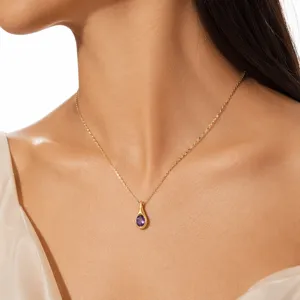 Elegant gold-tone chain necklace featuring a stunning teardrop purple cubic zirconia pendant.