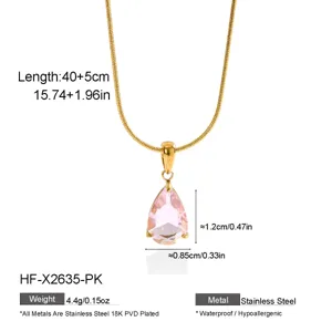 Detail view of gold snake chain necklace with pink pear crystal pendant, stainless steel.