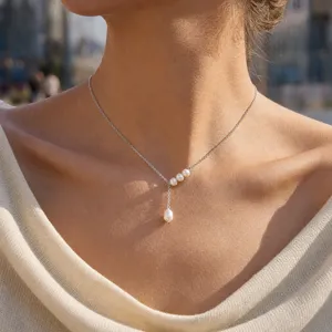 Elegante silberne Edelstahl Süßwasserperlen Y Halskette schicke Kropfkette Schmuck für Damen