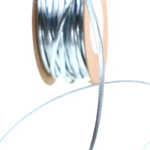 2mm silver PU leather cord for DIY jewelry making, braided craft cord on spool main view.