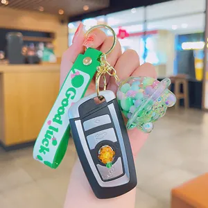 Cute green quicksand keychain oil filled floating liquid bag charm creative key ring
