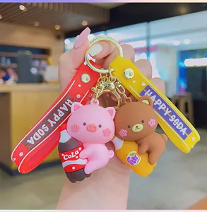 Mignon porte-clés de dessin animé animal soda avec deux pendentifs pour sacs et cadeaux.