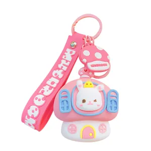 Cute pink mushroom house silicone keychain with rabbit doll, perfect bag pendant and accessory.