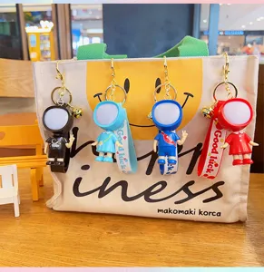 Cute luminous astronaut keychain couple bag pendant cartoon backpack hanging ornament
