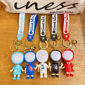 Luminous cartoon astronaut doll keychain and cute bag pendant for couples and gifts.