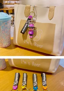 Cartoon monster character keychain and handbag charm set, cute backpack pendant accessory.