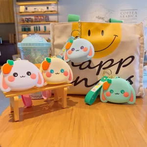 Cute rabbit silicone coin purse mini keychain bag charm for kids and daily use style.
