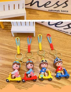 Cute scooter couple keychain cartoon doll pendant for student school bag car key accessory.