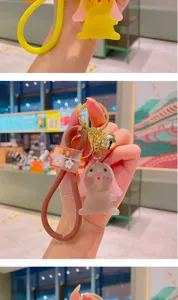 Cute frosted rabbit keychain with silicone strap and cute bell, perfect bag charm pendant.