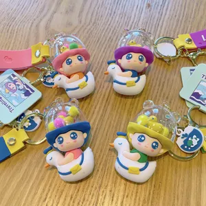 Cute cartoon duck capsule keychain PVC trendy bag pendant lovely car key ring accessory.