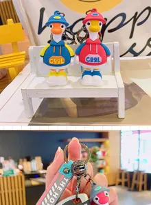 Simpatico portachiavi papera di tendenza dettaglio, ciondolo borsa coppia in silicone.