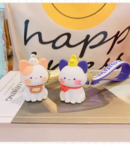 Simpatico portachiavi gatto dei cartoni animati con decorazione pulcino per borsa.