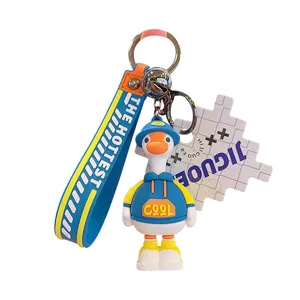 Portachiavi papera alla moda carino con cinturino blu e design cartoon per borse.