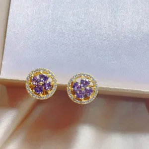 Exquisite gold plated purple cubic zirconia clover stud earrings, main front view display.
