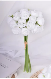 Detailed close-up of artificial white peony camellia flower bouquet, elegant floral decor.