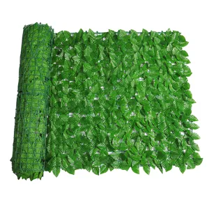 Artificial green leaf fence roll for garden decor, durable plastic plant hedge net.