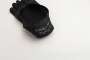 Black five-toe invisible boat socks detail view, soft cotton anti-slip design for women.