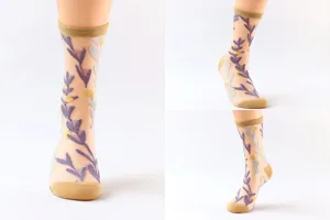 Sheer mesh floral embroidered socks detail view, stylish summer translucent mid-tube stockings.