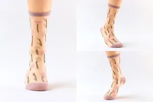 Sheer mesh mid-tube socks for women featuring cute embroidered floral patterns, perfect for summer.