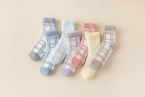 Cozy winter thick plaid coral fleece women socks detail shot, soft fuzzy floor socks warm.