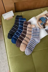 Thick fleece striped fuzzy socks for men and women, cozy winter sleep and floor socks set.