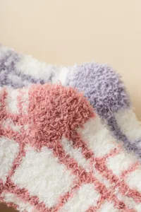 Soft fuzzy winter coral fleece plaid socks detail, warm comfortable indoor floor use.