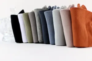 Detail view of men's breathable cotton short boat socks, neatly arranged in multiple colors.