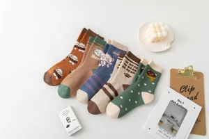 Cozy winter thick cotton mid-tube socks featuring cute bear patterns, stripes, and dots for daily wear.