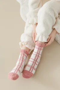 Cozy coral fleece thickened plaid women socks detail, soft winter warm hosiery style.