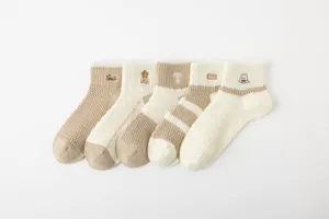 Detailed view of breathable mesh short socks for women featuring cute embroidery designs.