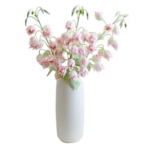 Artificial bellflower flower bouquet in white ceramic vase for wedding home decor